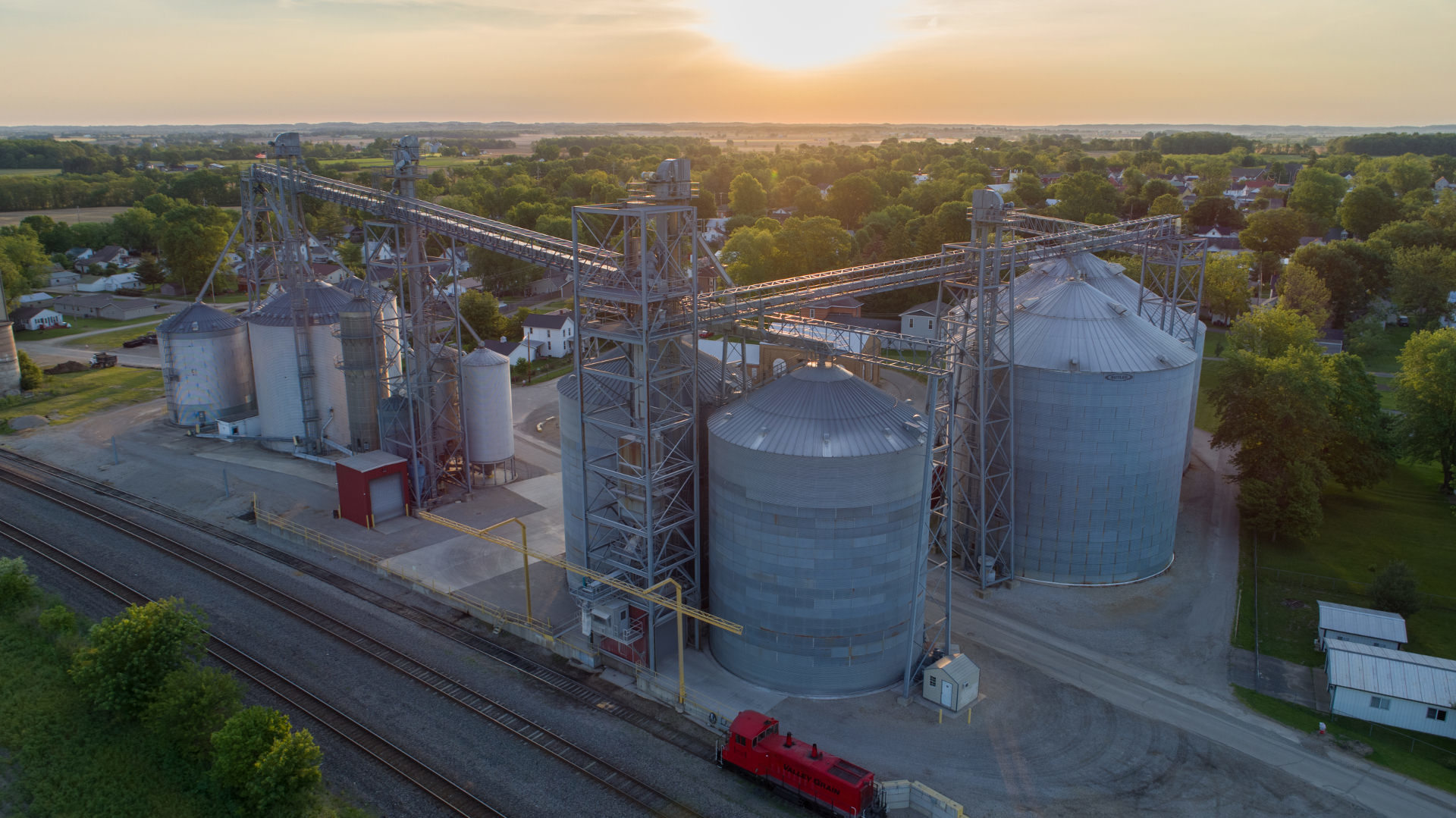 The sun rises over Valley Grain Elevator